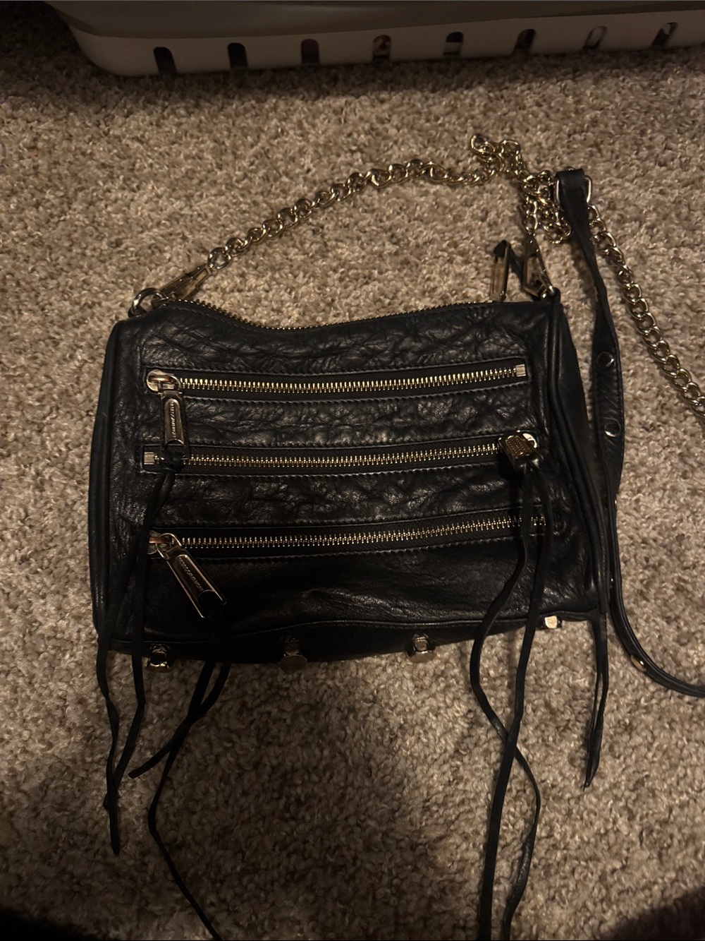 Rebecca Minkoff Black Leather Crossbody Bag with Gold Chain and Zipper Accents